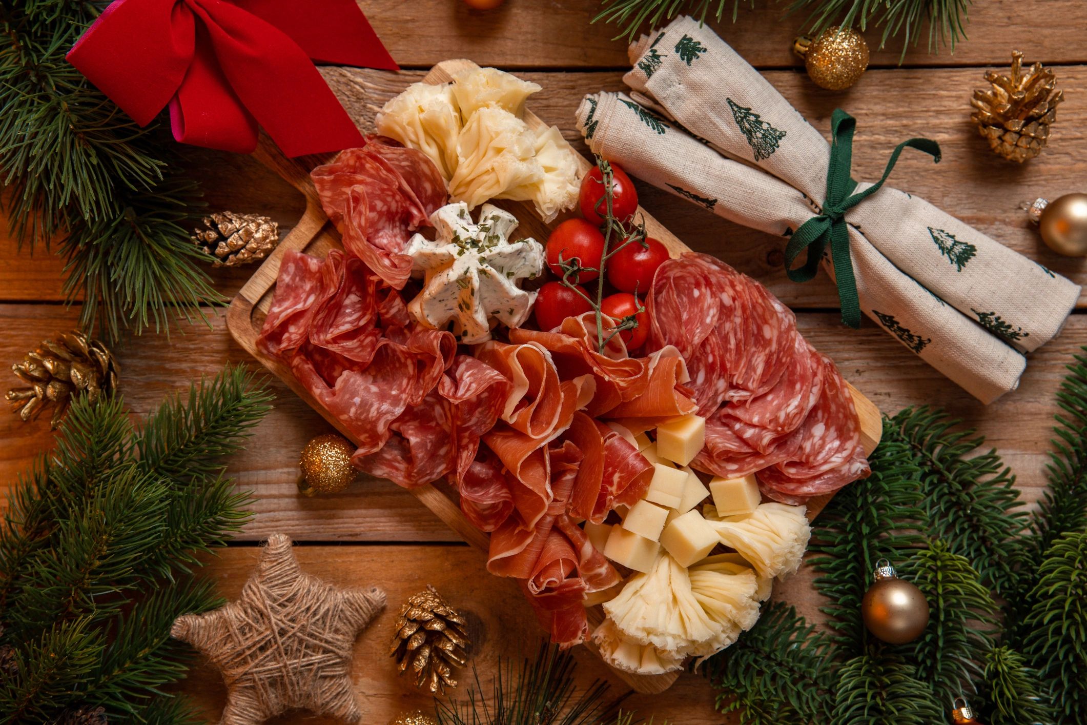 Rustic charcuterie board with meats and cheeses
